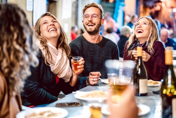 Restaurant patio with guests enjoying insect-free outdoor dining